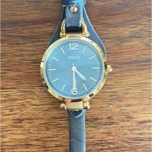 Gold and gray leather Fossil watch